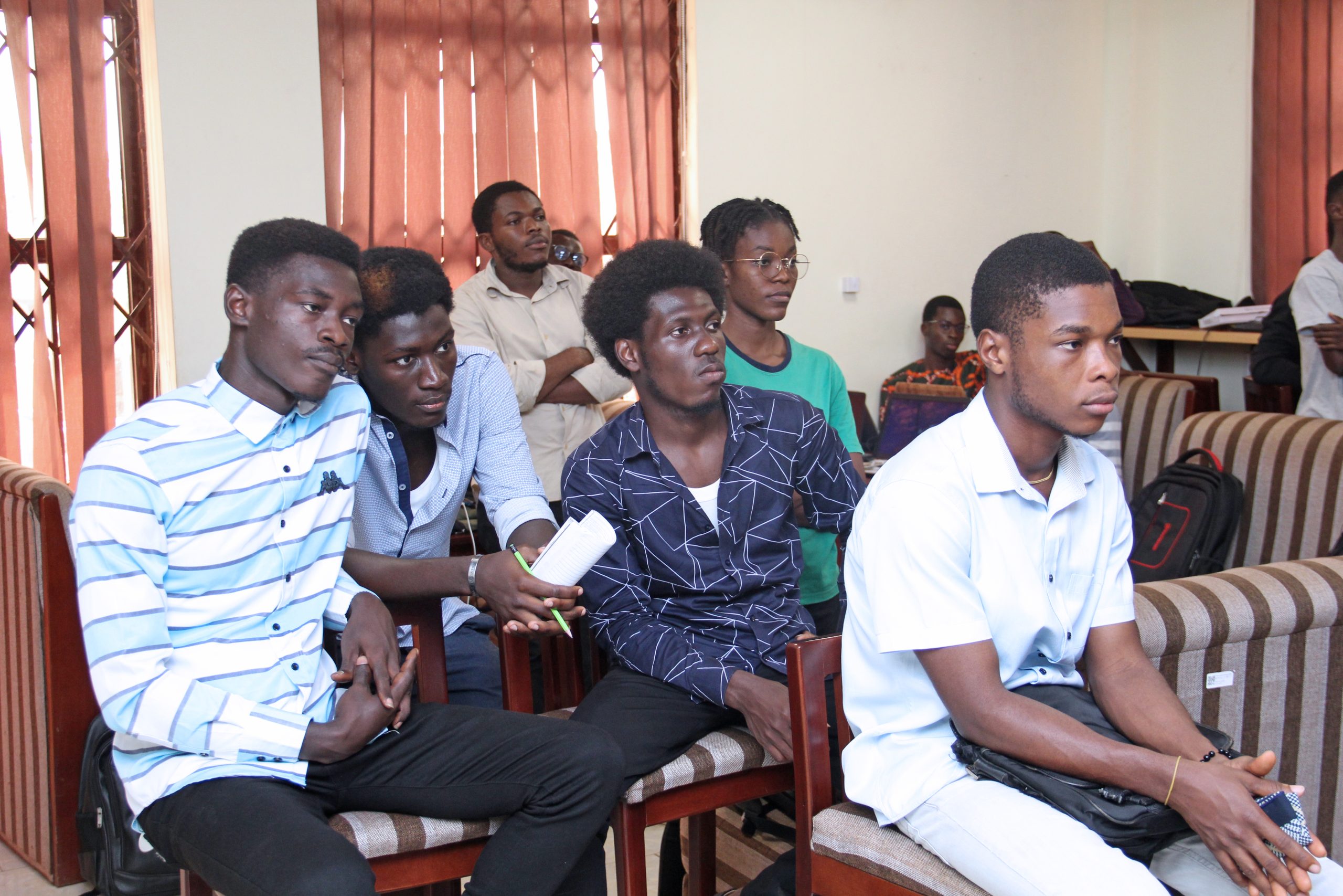 Young people watching a presentation