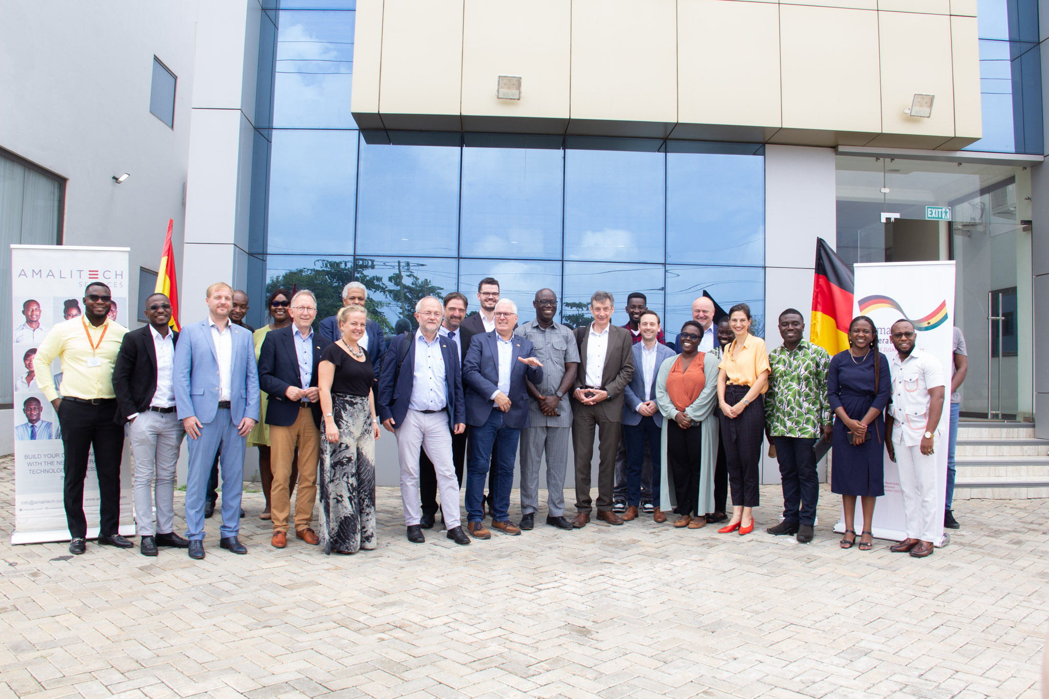 a group of people posing for a corporate shot